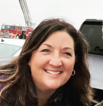 woman with brown hair smiling