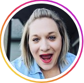 woman wearing a blue shirt with her mouth open showing excitement