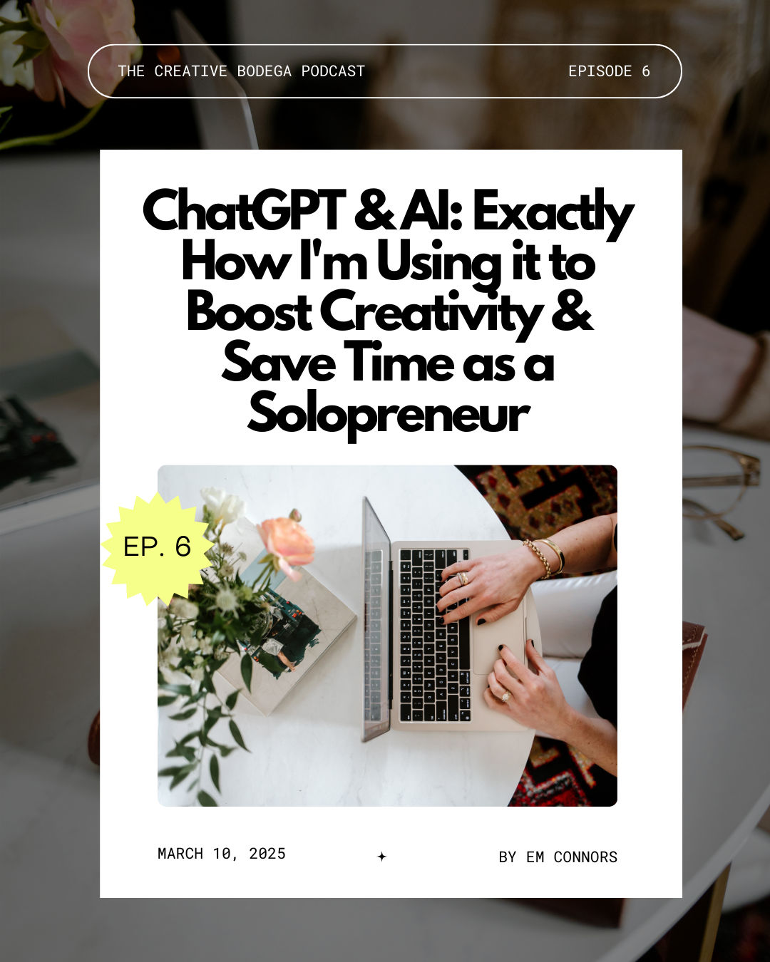 Overhead view of Em's hands on her Macbook on top of a marble coffee table